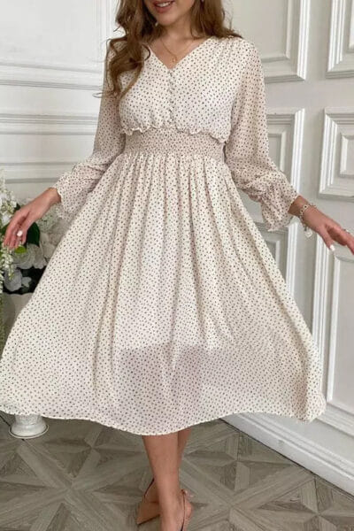 Elegantes weißes Boho Kleid mit langen Ärmeln